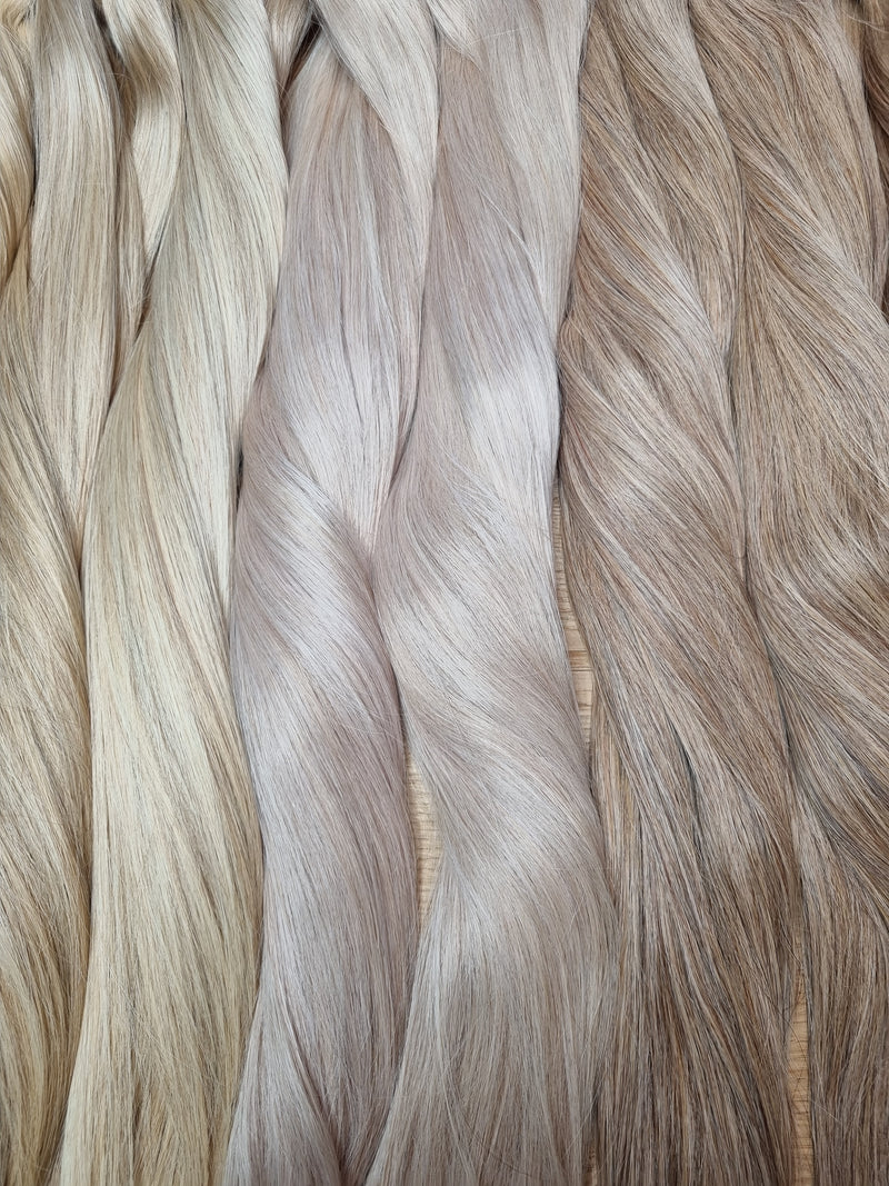 100 % Echthaar Extensions für professionelle Haarverlängerung und Haarverdichtung bei CK Hair in Augsburg – hochwertige Echthaar Extensions in natürlichen Farbnuancen für ein unsichtbares und natürliches Ergebnis.